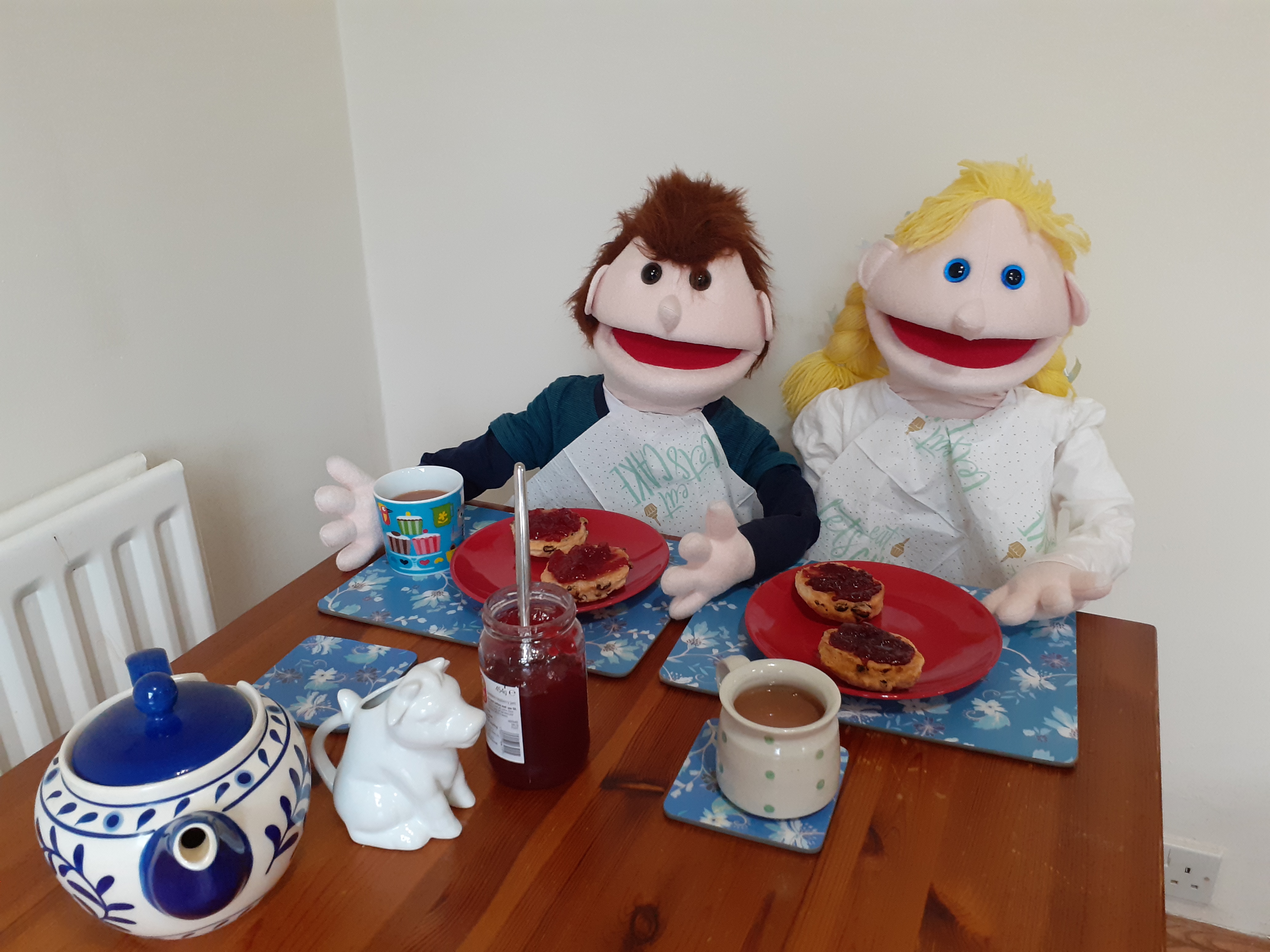 Puppets Jack and Polly enjoying afternoon tea 